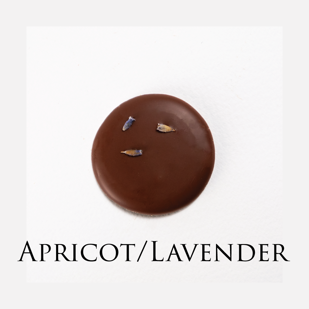 Apricot & lavender chocolate! Delicate chocolate palet, milk and dark collection. Yann Haute Patisserie, best cakes in this authentic & traditional French bakery & pastry shop in a yellow house in Calgary. Relais Desserts Pastry chef Yann Blanchard creates fresh desserts, cakes, macarons, ice cream, Canneles, croissants, baguette & bread.