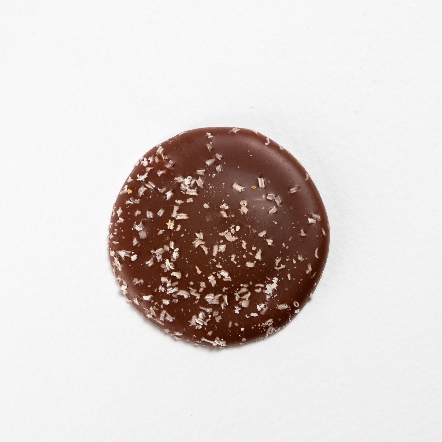 Caramel Chocolate palet made with Valrhona, best chocolate. Only real and natural ingredients at Yann Haute Patisserie, authentic & traditional French bakery & pastry shop in a yellow house in Calgary. Relais Desserts Pastry chef Yann Blanchard creates desserts, cakes, macarons, ice cream, Canneles, croissants, baguette & bread.