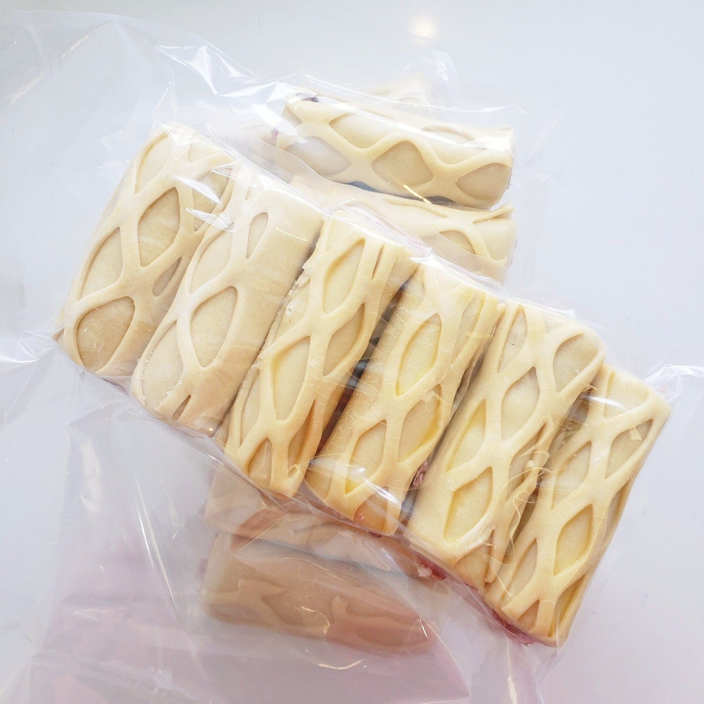 Sausage rolls (pork) from a local family farm in our handmade buttery dough at Yann Haute Patisserie!