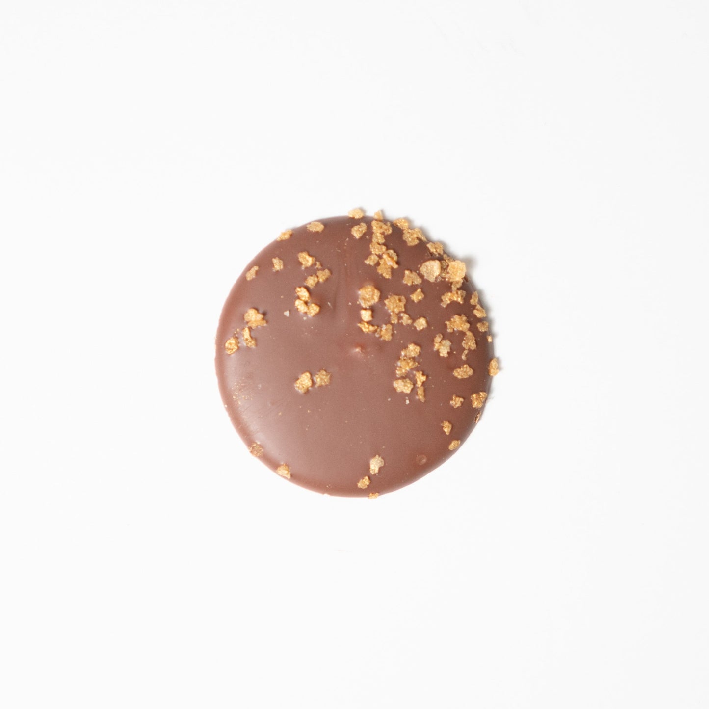 Hazelnut Chocolate palet made with Valrhona, best chocolate. Only real and natural ingredients at Yann Haute Patisserie, authentic & traditional French bakery & pastry shop in a yellow house in Calgary. Relais Desserts Pastry chef Yann Blanchard creates desserts, cakes, macarons, ice cream, Canneles, croissants, baguette & bread.