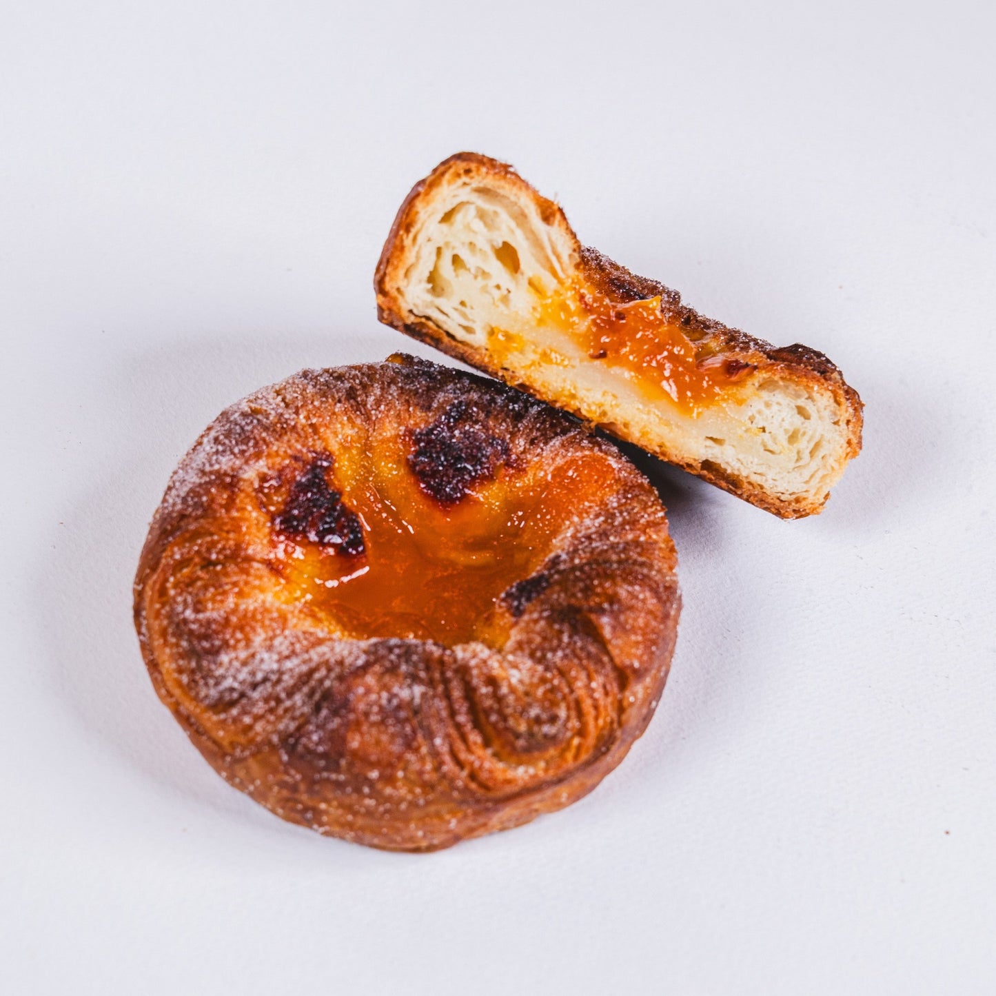 Kouign-amann Frozen to oven in bags of 6 or baked to have at the ready! Yann Haute Patisserie for the best desserts & croissants in Calgary!