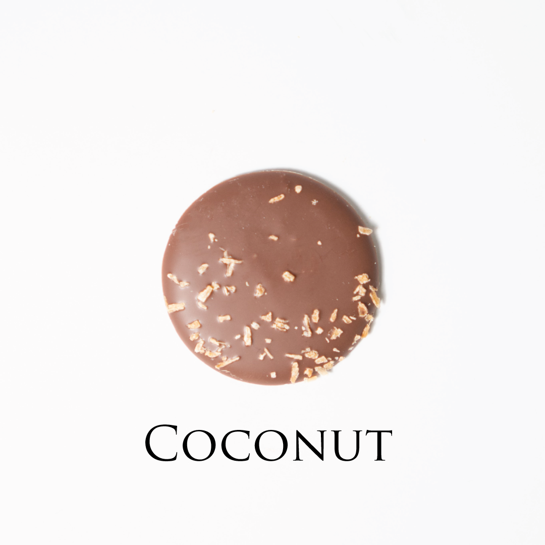 Coconut chocolate! Delicate chocolate palet, milk and dark collection. Yann Haute Patisserie, best cakes in this authentic & traditional French bakery & pastry shop in a yellow house in Calgary. Relais Desserts Pastry chef Yann Blanchard creates fresh desserts, cakes, macarons, ice cream, Canneles, croissants, baguette & bread.