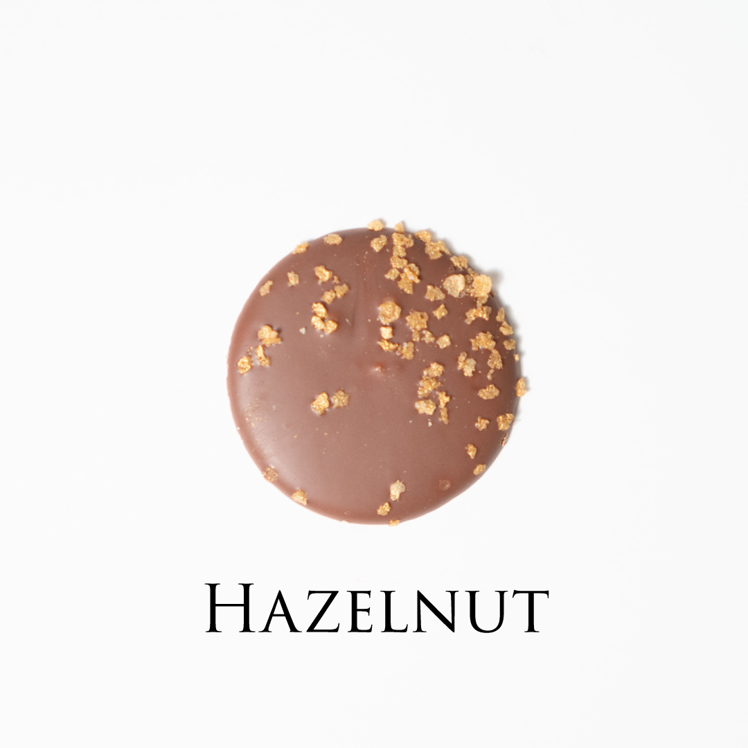 Hazelnut chocolate! Delicate chocolate palet, milk and dark collection. Yann Haute Patisserie, best cakes in this authentic & traditional French bakery & pastry shop in a yellow house in Calgary. Relais Desserts Pastry chef Yann Blanchard creates fresh desserts, cakes, macarons, ice cream, Canneles, croissants, baguette & bread.