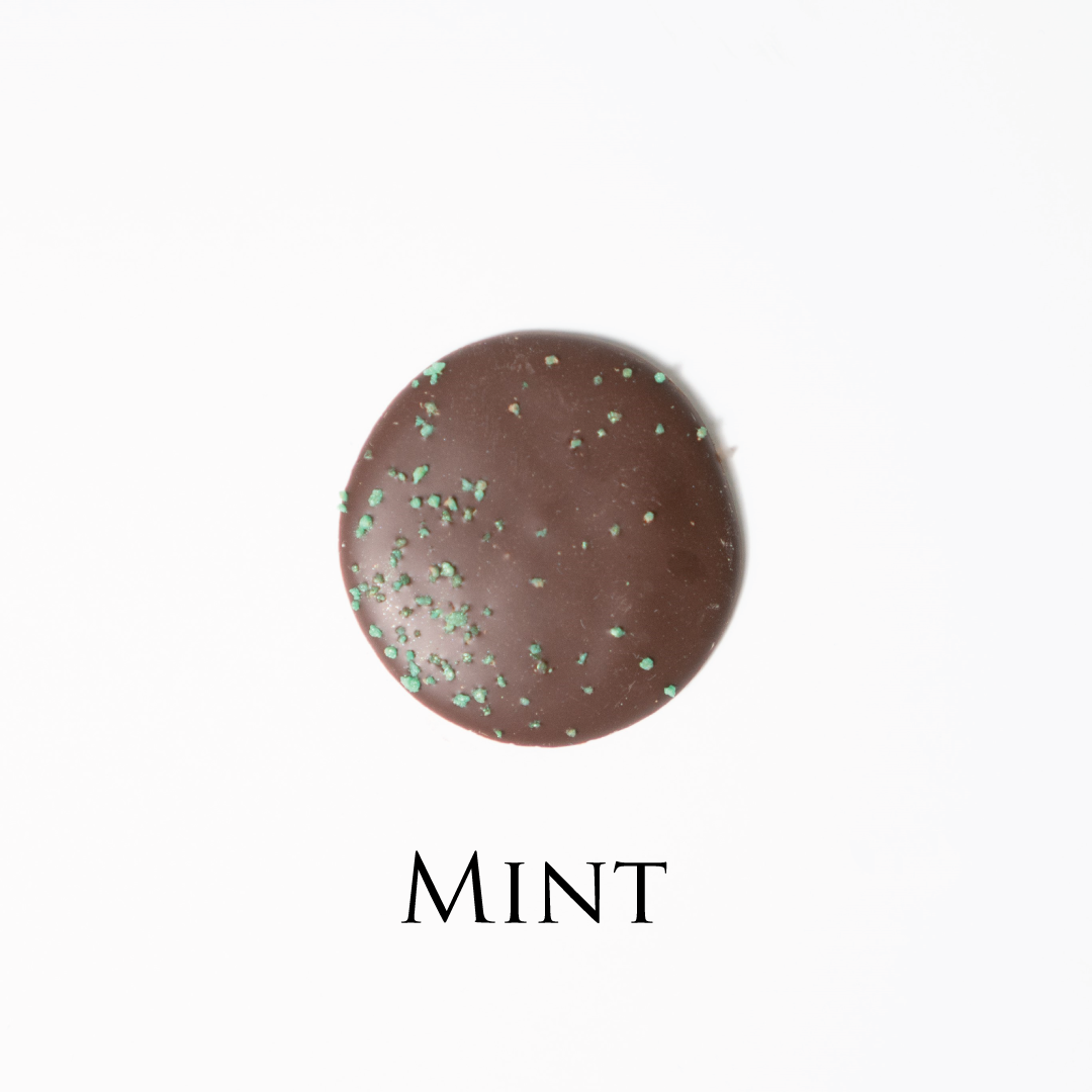 Mint chocolate! Delicate chocolate palet, milk and dark collection. Yann Haute Patisserie, best cakes in this authentic & traditional French bakery & pastry shop in a yellow house in Calgary. Relais Desserts Pastry chef Yann Blanchard creates fresh desserts, cakes, macarons, ice cream, Canneles, croissants, baguette & bread.