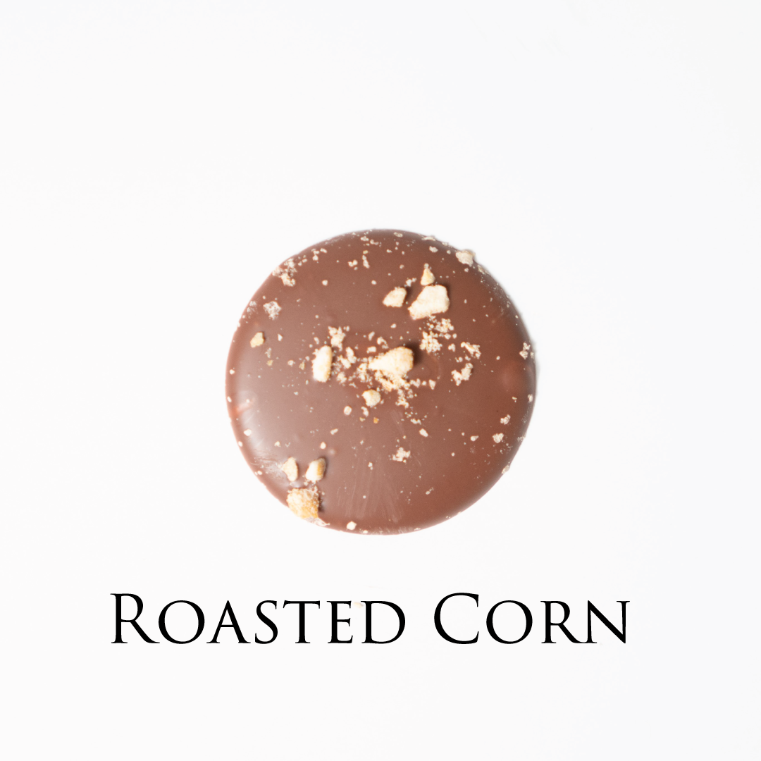 Roasted corn chocolate! Delicate chocolate palet, milk and dark collection. Yann Haute Patisserie, best cakes in this authentic & traditional French bakery & pastry shop in a yellow house in Calgary. Relais Desserts Pastry chef Yann Blanchard creates fresh desserts, cakes, macarons, ice cream, Canneles, croissants, baguette & bread.