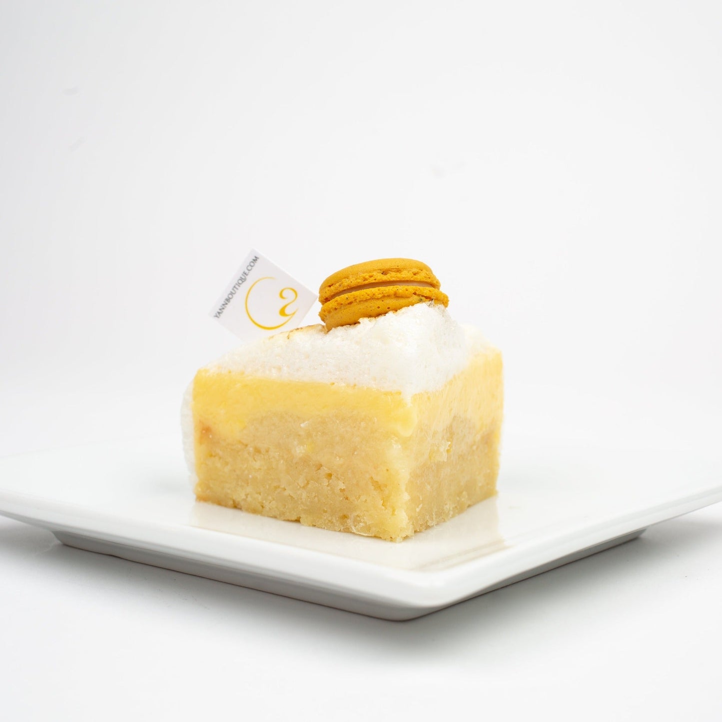 Almond and lemon cake finished with a soft meringue top, Calgary.- Gluten Free - Yann Haute Patisserie, authentic French bakery for the best desserts, cakes, croissants and macarons in this happy yellow house pastry shop.