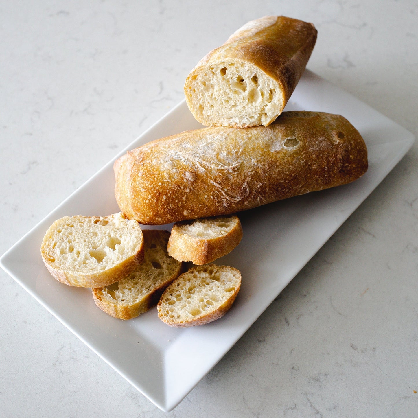 Yann Haute Patisserie, authentic French bakery for the best desserts, cakes, croissants and macarons in this happy yellow house pastry shop.