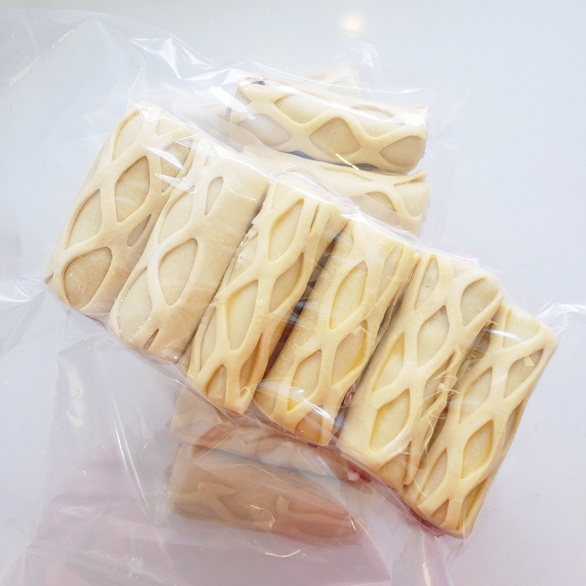 Sausage rolls (pork) from a local family farm in our handmade buttery dough at Yann Haute Patisserie!