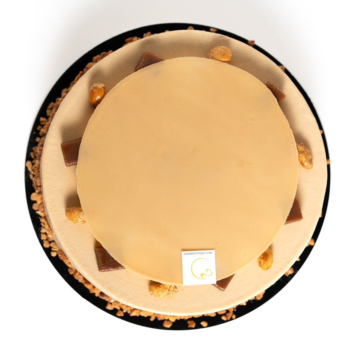 Alcohol-free French caramel cake with Dulcey chocolate, cashew, vanilla bean and contrasting creamy and crunchy textures.