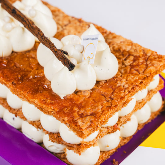 Traditional French mille-feuille handcrafted with caramelized puff pastry and Madagascar vanilla bean cream in Calgary.