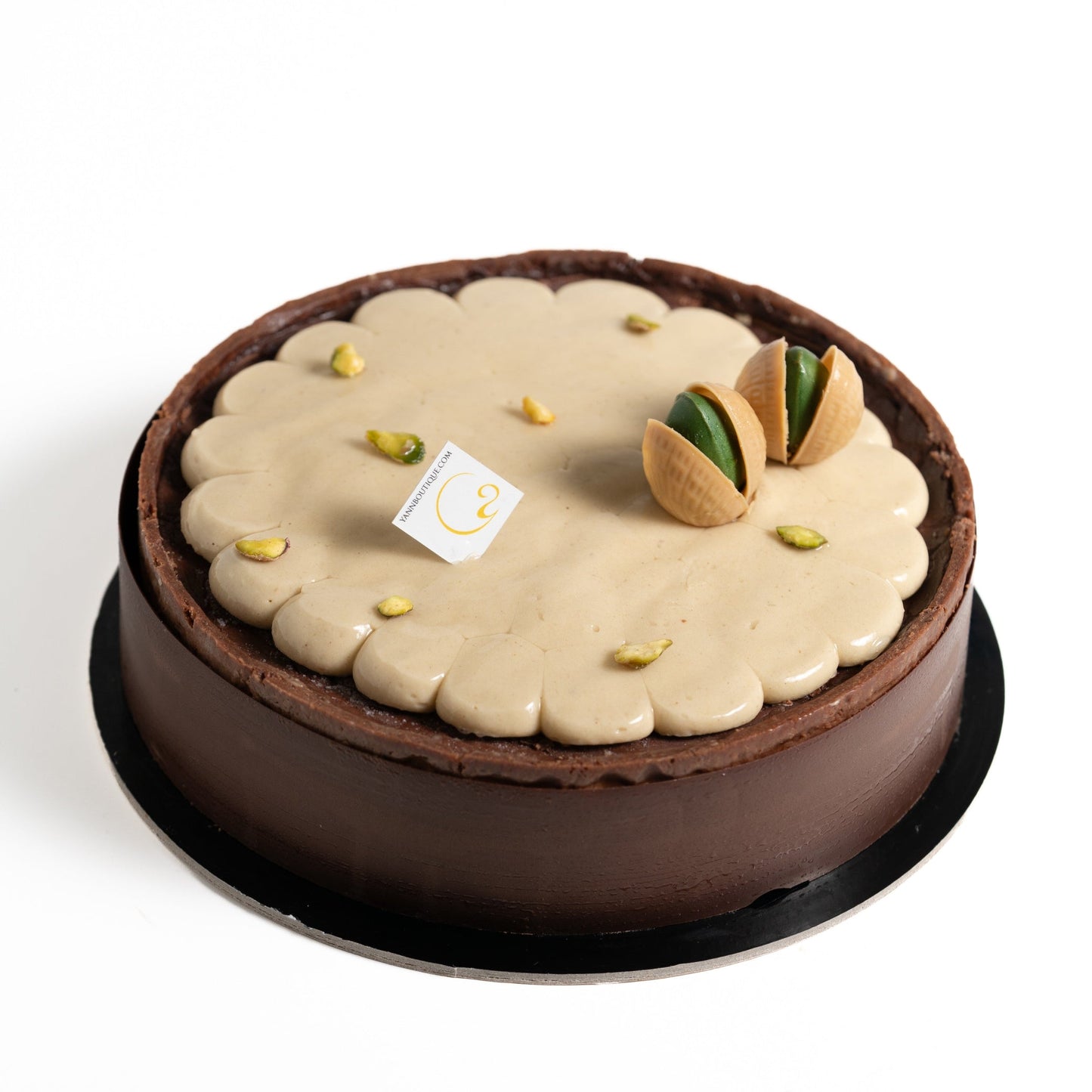 Pistache Noire dark chocolate and pistachio cake by Yann Haute Patisserie in Calgary.