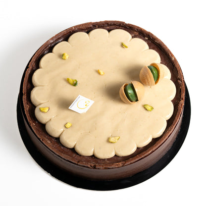 Pistache Noire layered with smooth whipped pistachio ganache, rich dark chocolate crème brûlée and pistachio brownie.