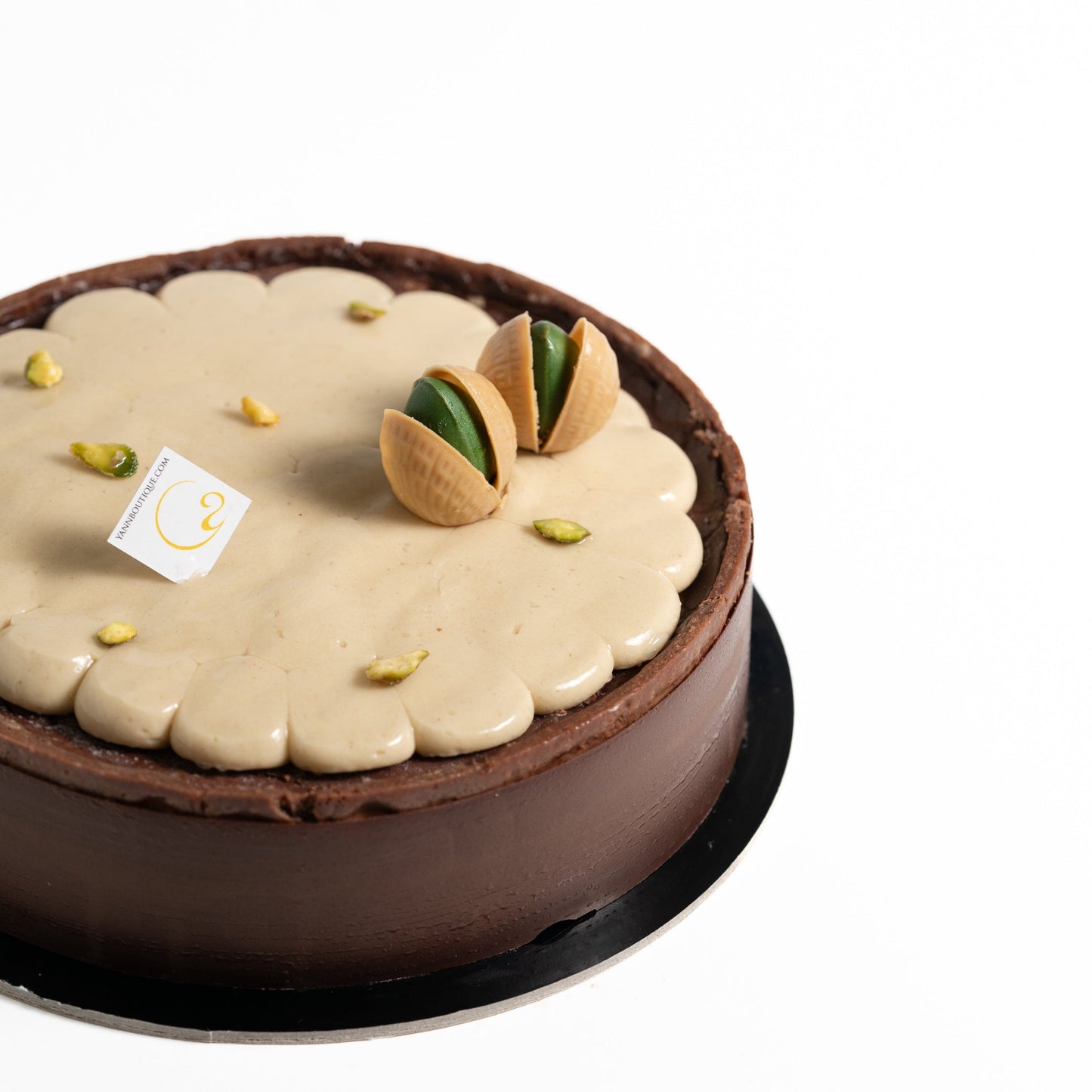 Pistache Noire signature chocolate pistachio cake from Yann Haute Patisserie, made without gelatin or alcohol.