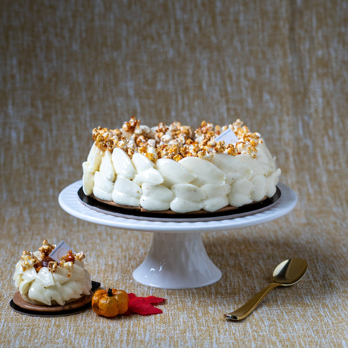 French Thanksgiving cake featuring pumpkin crème brûlée, vanilla bean chantilly, white chocolate Sacher cake and thin shortbread.