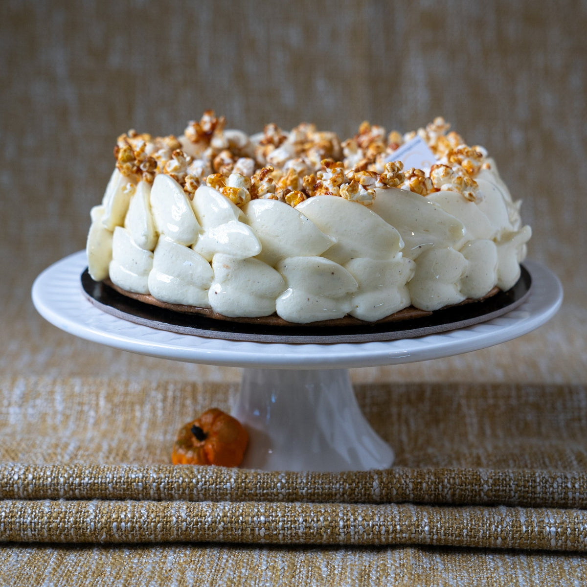 Limited-edition Thanksgiving cake in Calgary with vanilla bean chantilly, pumpkin crème brûlée and white chocolate Sacher cake.