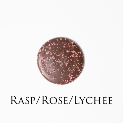 Raspberry / Rose/ Lychee chocolate! Delicate chocolate palet, milk and dark collection. Yann Haute Patisserie, best cakes in this authentic & traditional French bakery & pastry shop in a yellow house in Calgary. Relais Desserts Pastry chef Yann Blanchard creates fresh desserts, cakes, macarons, ice cream, Canneles, croissants, baguette & bread.