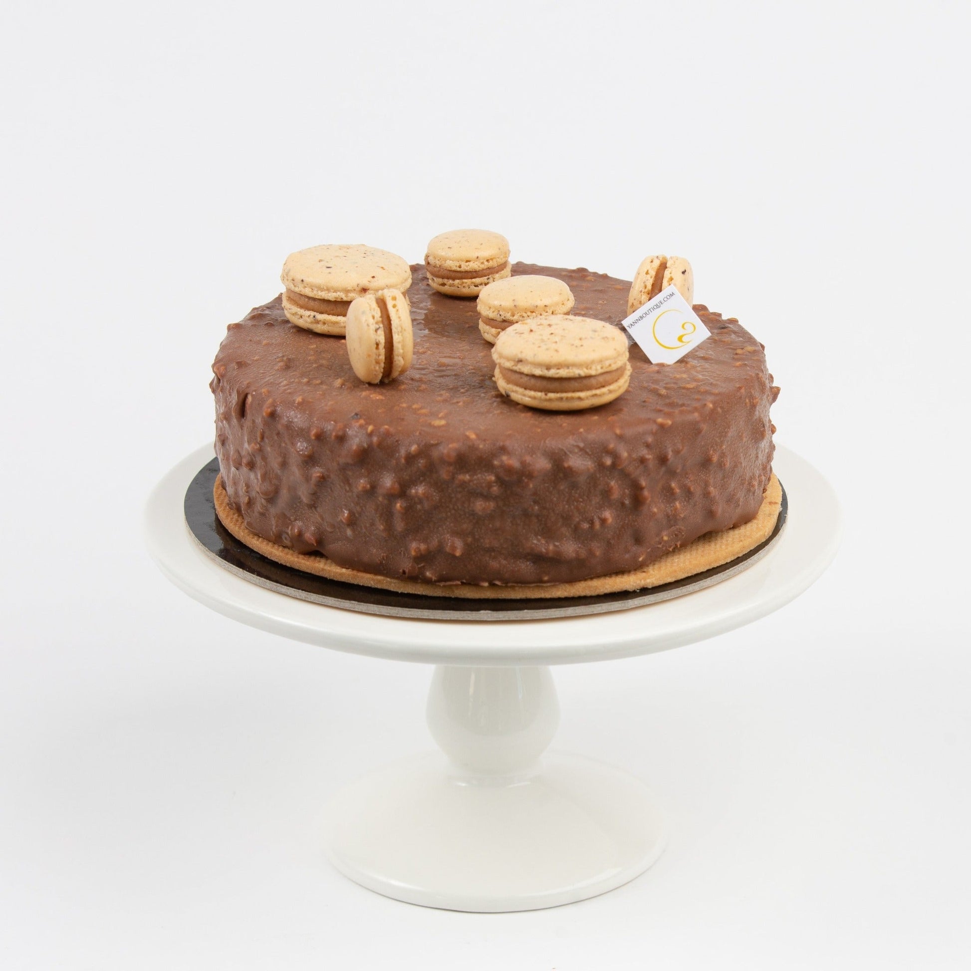 Best hazelnut cakes in Calgary! Yann Haute Patisserie, authentic French bakery for the best desserts, cakes, croissants and macarons in this happy yellow house pastry shop. 