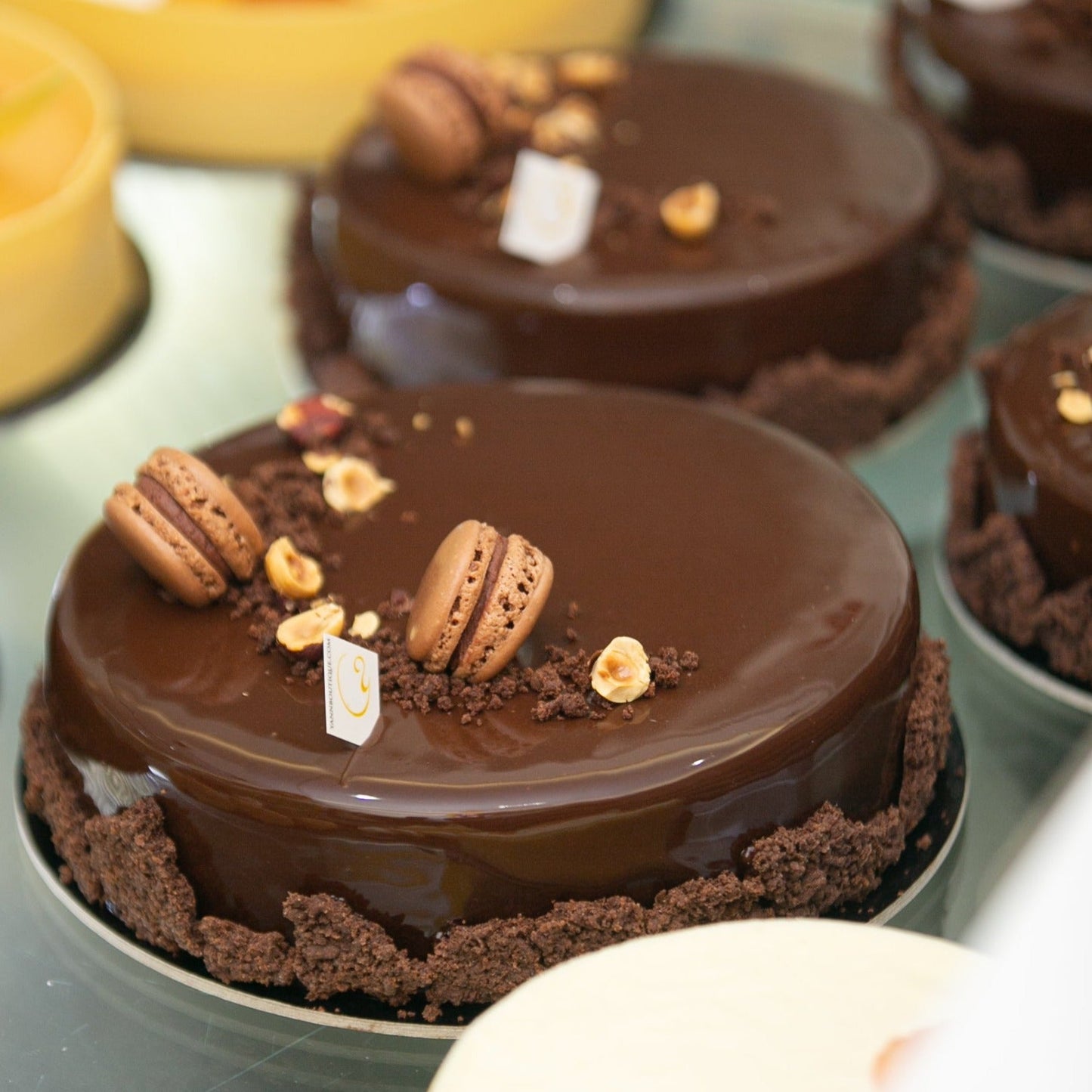Elegant chocolate hazelnut Royal cake handcrafted at Yann Haute Patisserie in Calgary.
